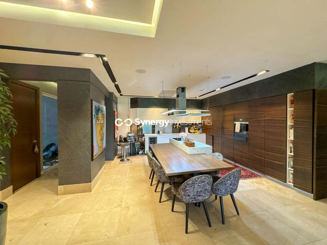 Modern luxury bathroom with marble walls and double vanity at The Reserve Panama