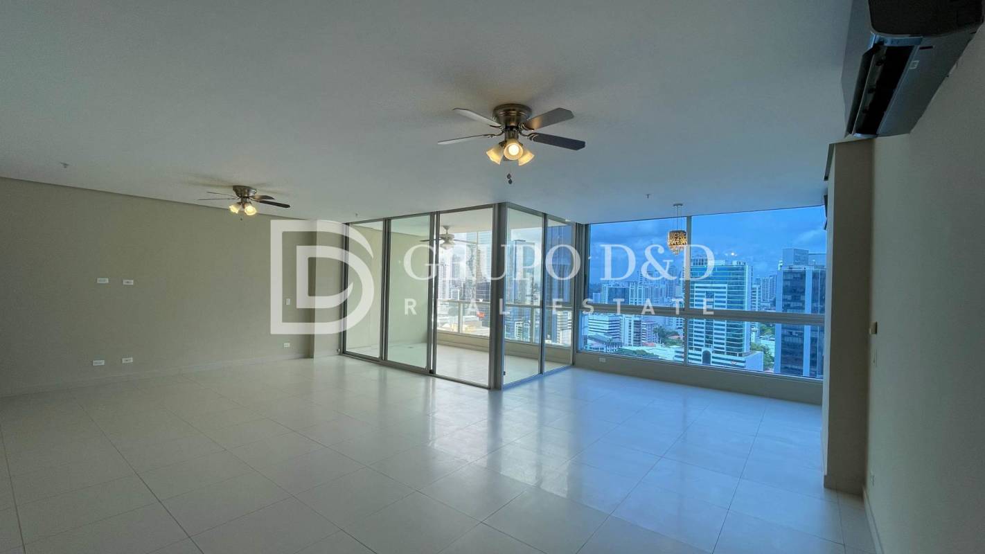Large open living and dining room with panoramic windows in PH Marbella 47 Panama
