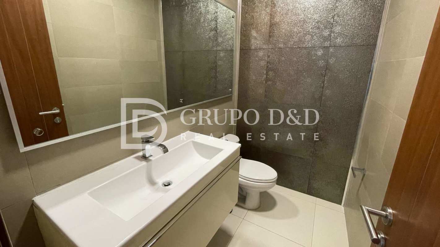 Spacious master bedroom with large window, ensuite bath and city skyline views PH Marbella 47