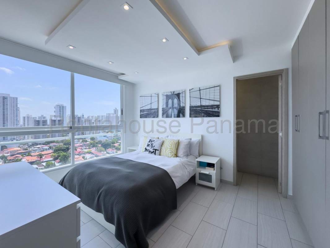Master bedroom with city view, large window and stylish finishes The Towers San Francisco