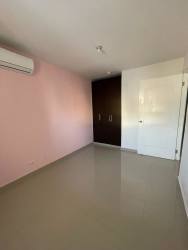 Second bedroom with AC unit, natural light, ceramic floor rental house Brisas del Campo