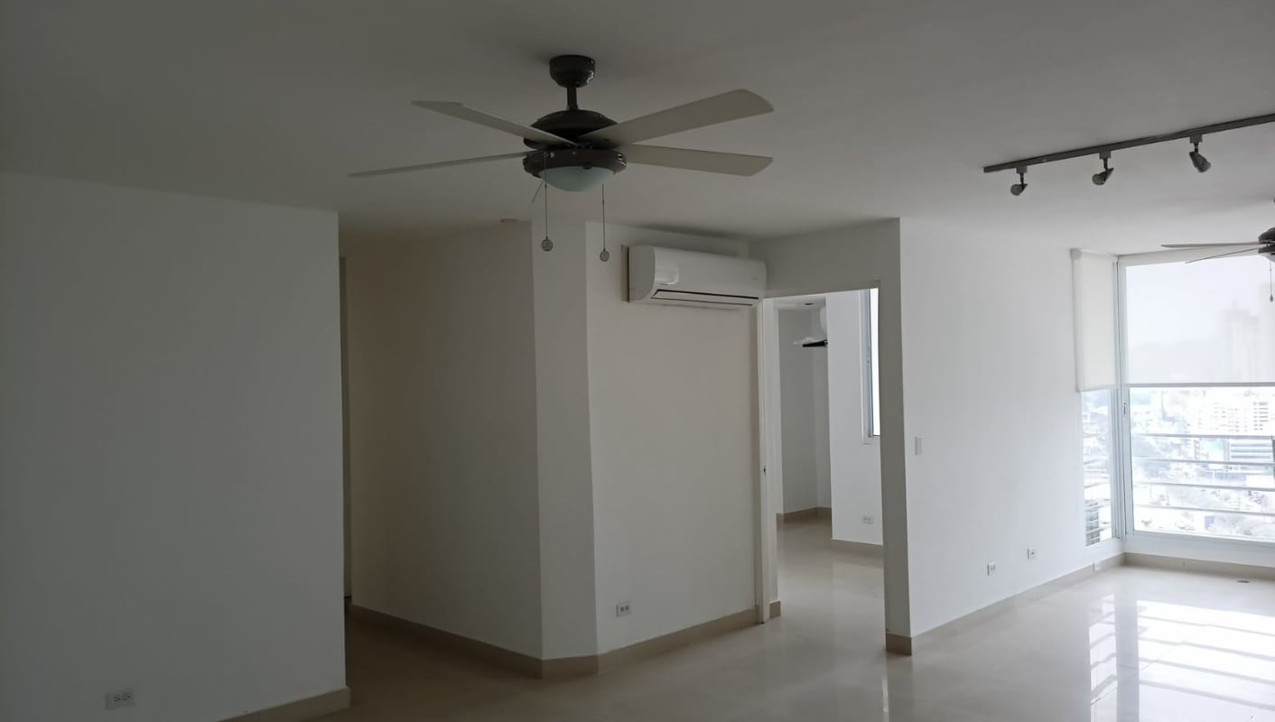 Spacious living room with large windows, balcony access, ceiling fans PH Dos Mares View II Betania Panama