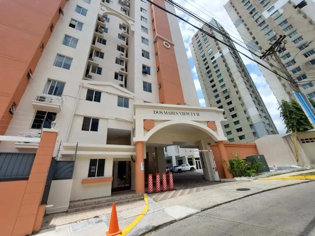 Modern living room with large windows balcony access and ceiling fan PH Dos Mares View Betania Panama