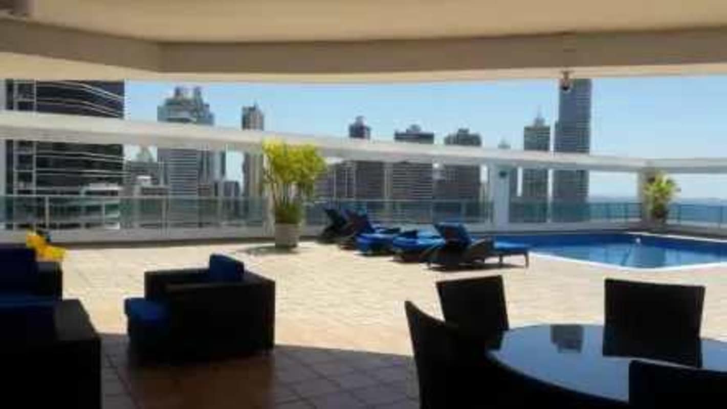 Modern terrace pool lounge with skyline and ocean views PH Bayfront Panama City
