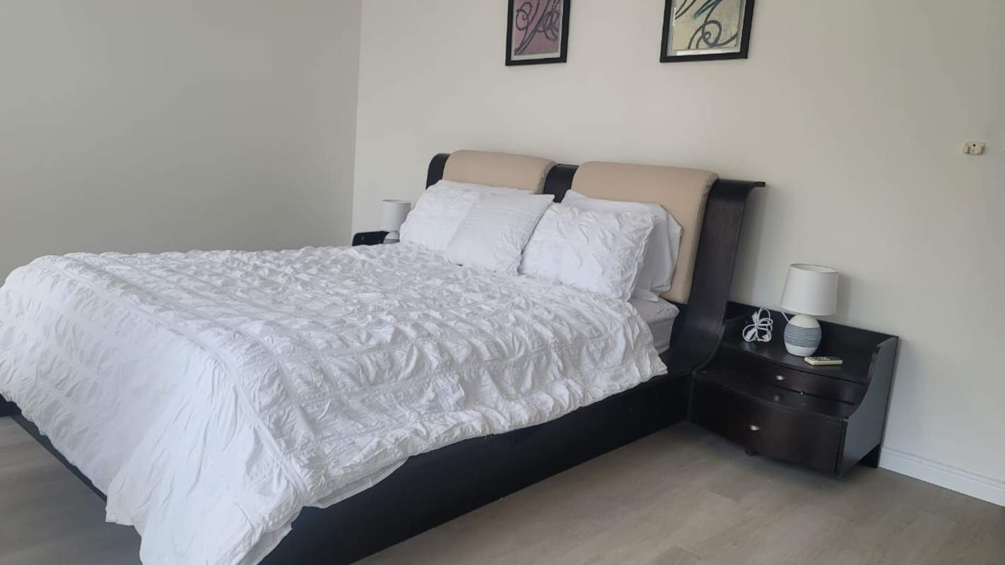 Spacious bedroom with king bed city and ocean views at PH Bayfront Avenida Balboa