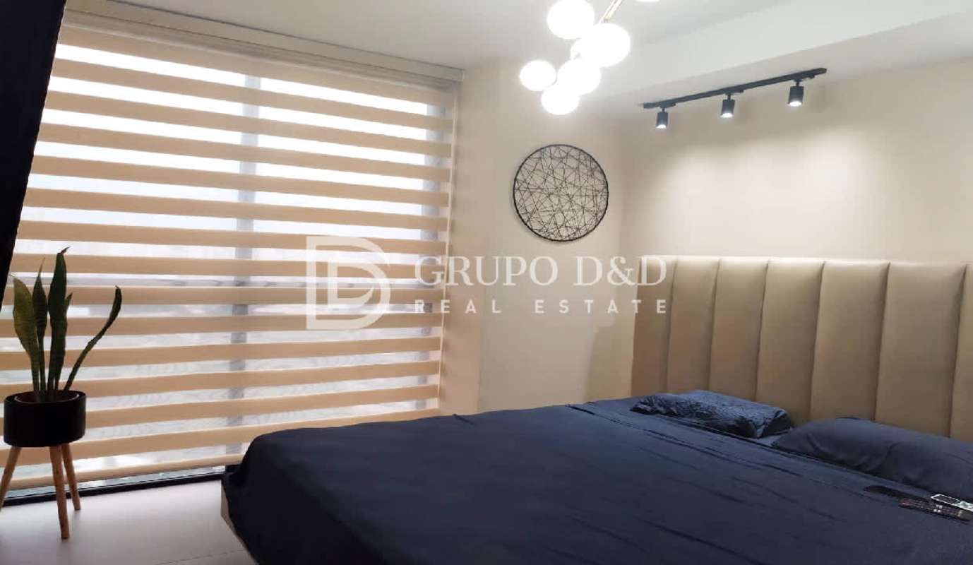 Contemporary bedroom with upholstered headboard and ocean views in PH Victory Sport Panama City