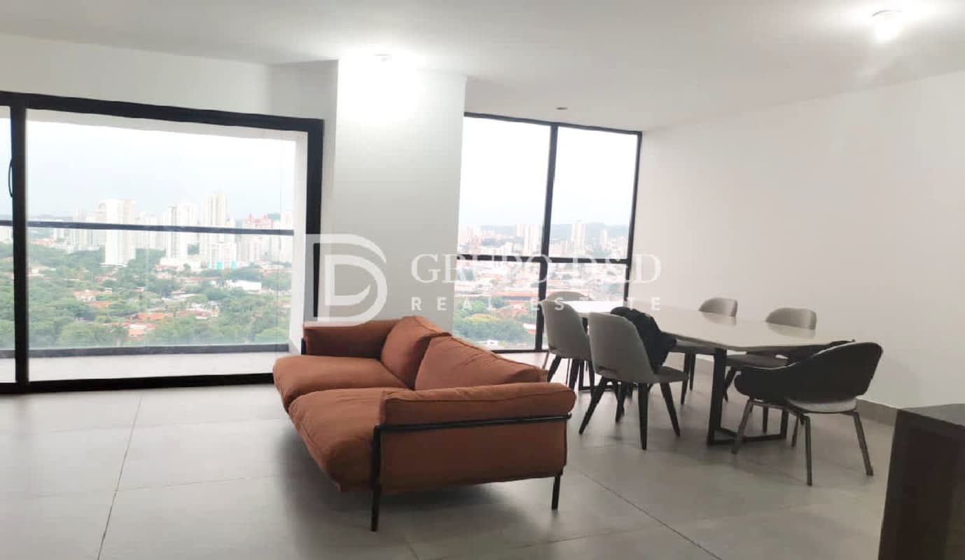 Living dining space with large windows and city skyline in PH Victory Sport Panama
