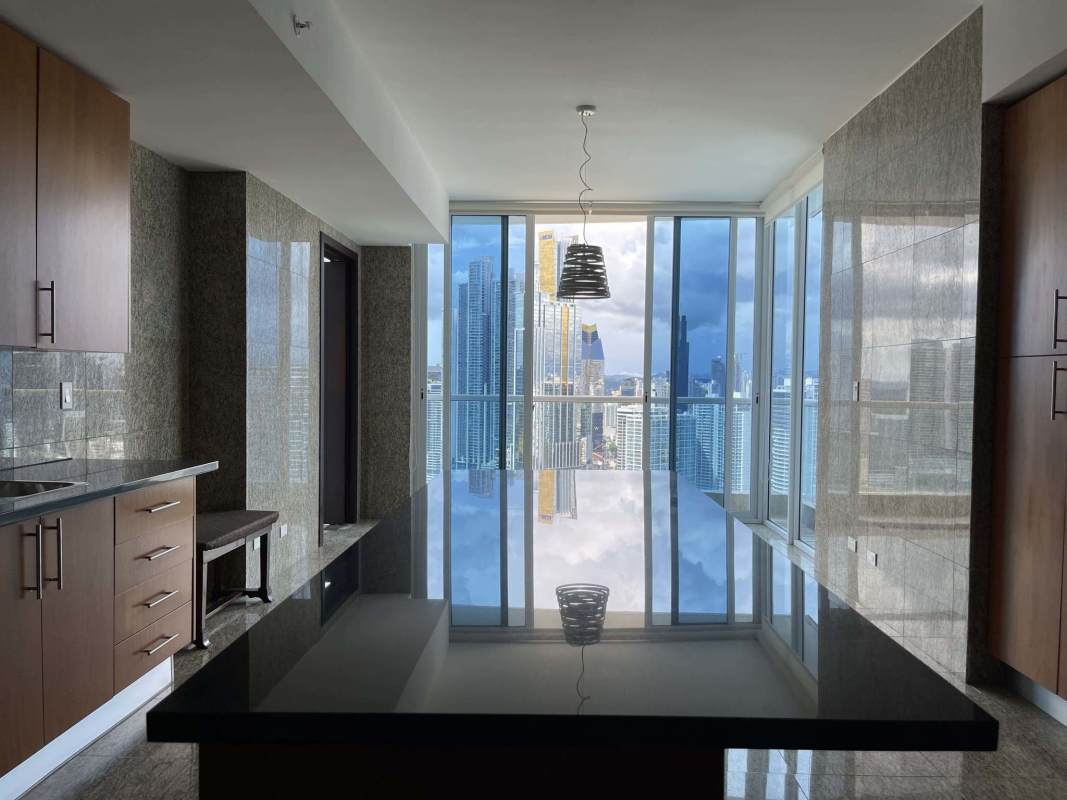 Modern kitchen with granite island, view to ocean skyline, premium appliances in PH The Point Punta Paitilla Panama