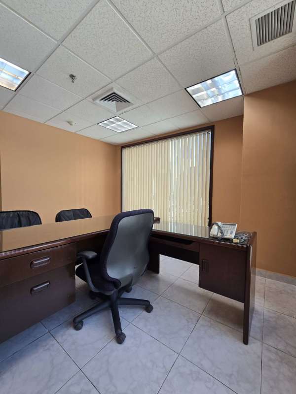 Reception entrance space in office unit in World Trade Center Panama with tiled floors