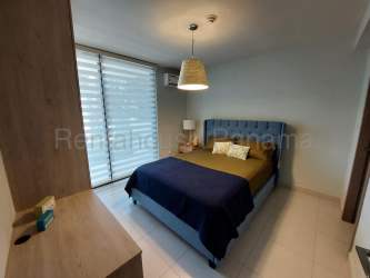 Modern bedroom with private balcony and ocean view at Ensenada Beach Resort San Carlos Panama