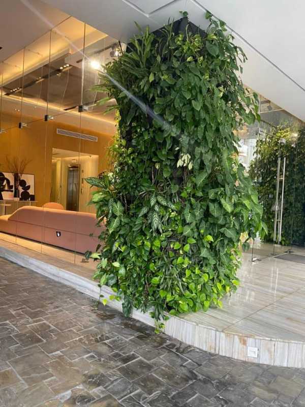 Lobby area with greenery, seating and artistic decor PH Velure Panama