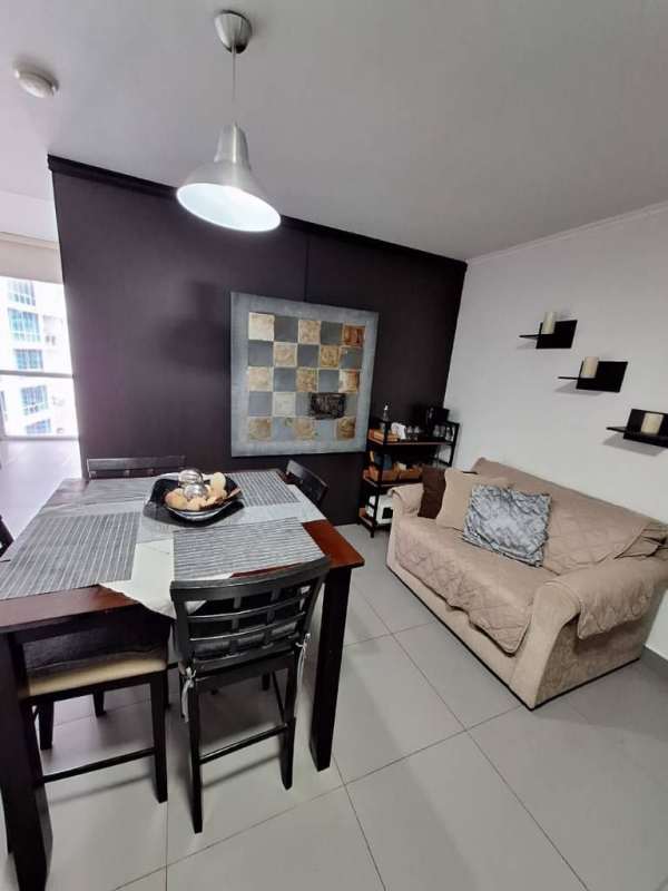 Open-concept living dining area furnished at PH Colores de Bella Vista Panama