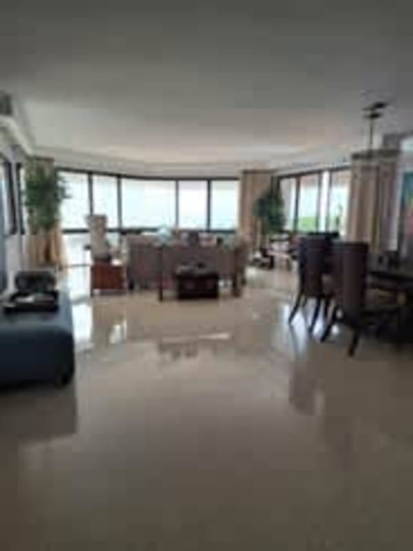 Large contemporary living dining room panoramic windows polished tile floor PH Costa Mar Tower Panama
