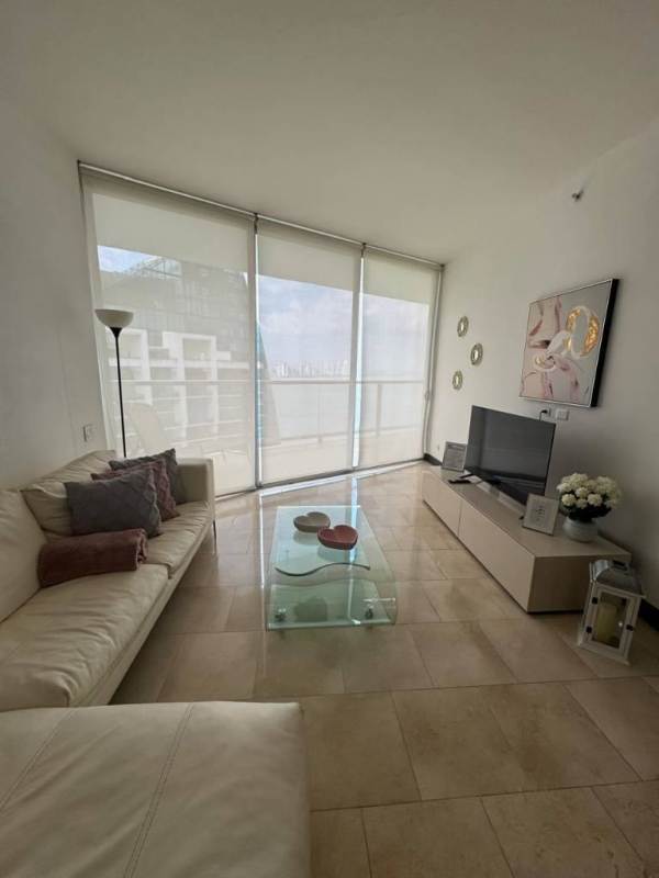 Dining area with glass table and granite kitchen in Punta Pacifica rental