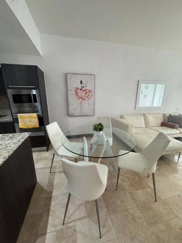 Furnished bedroom in JW Marriott with king bed walk-in closet ocean view