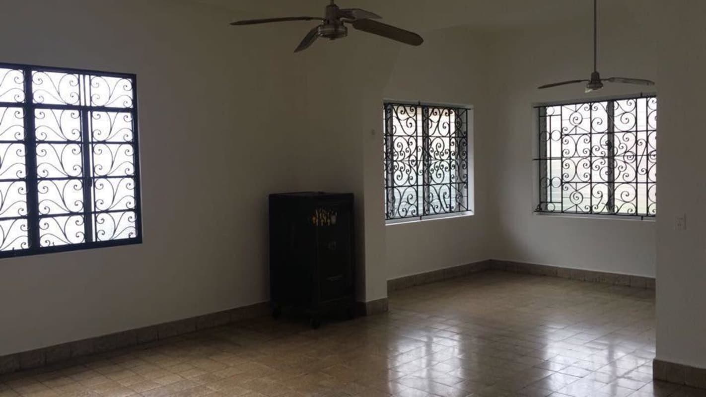 Spacious living room traditional design tiled floor ceiling fans Casa Roja Bella Vista