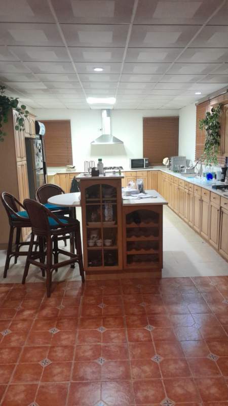 Spacious bedroom with natural light and built-in closet rental house Panama City