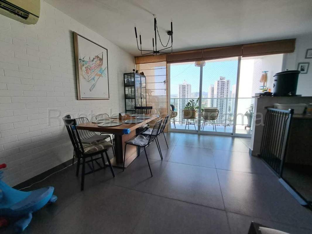Bright living dining area modern tile floors balcony access PH Condado Country Club