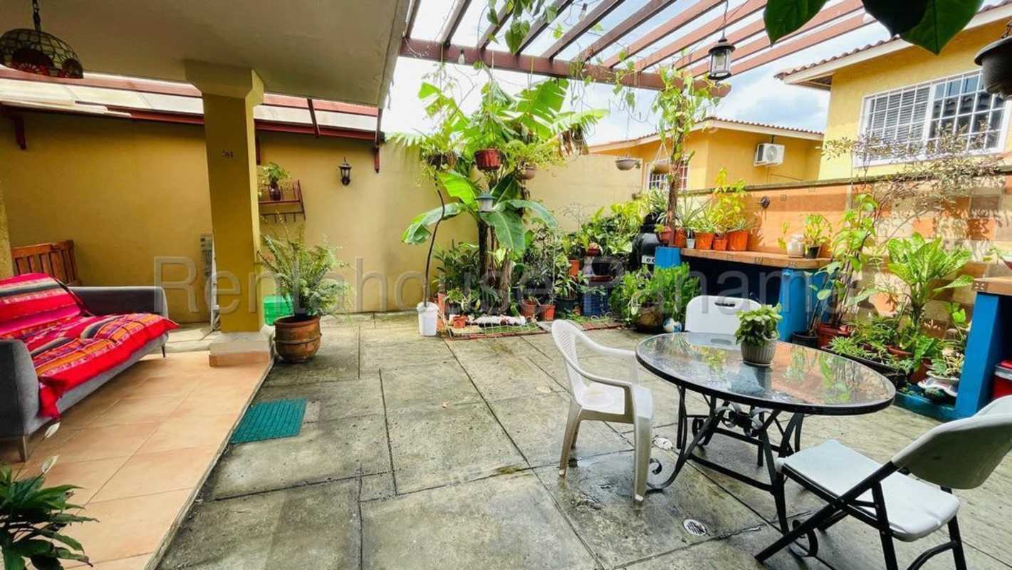 Beautiful landscaped pond with gazebo and walking path in Dorado Lake residential community Panama City