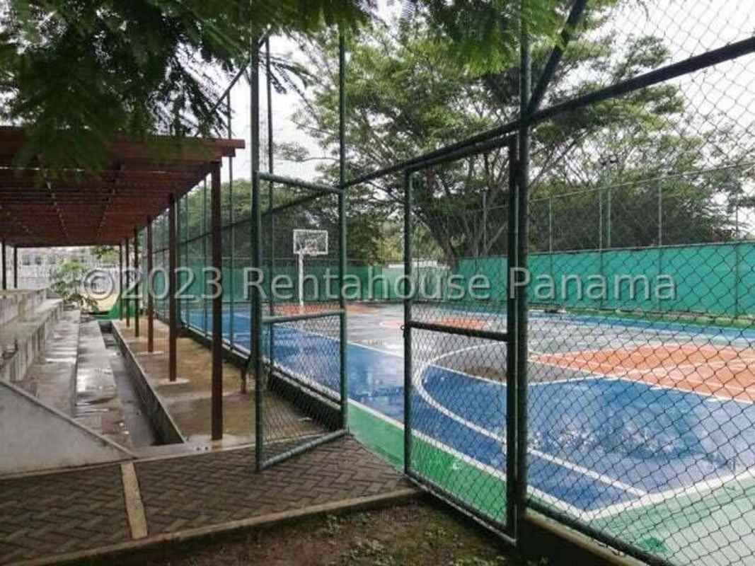 Swimming pool area palm trees sun deck PH Condado Country Club Condado del Rey Panama Real Estate