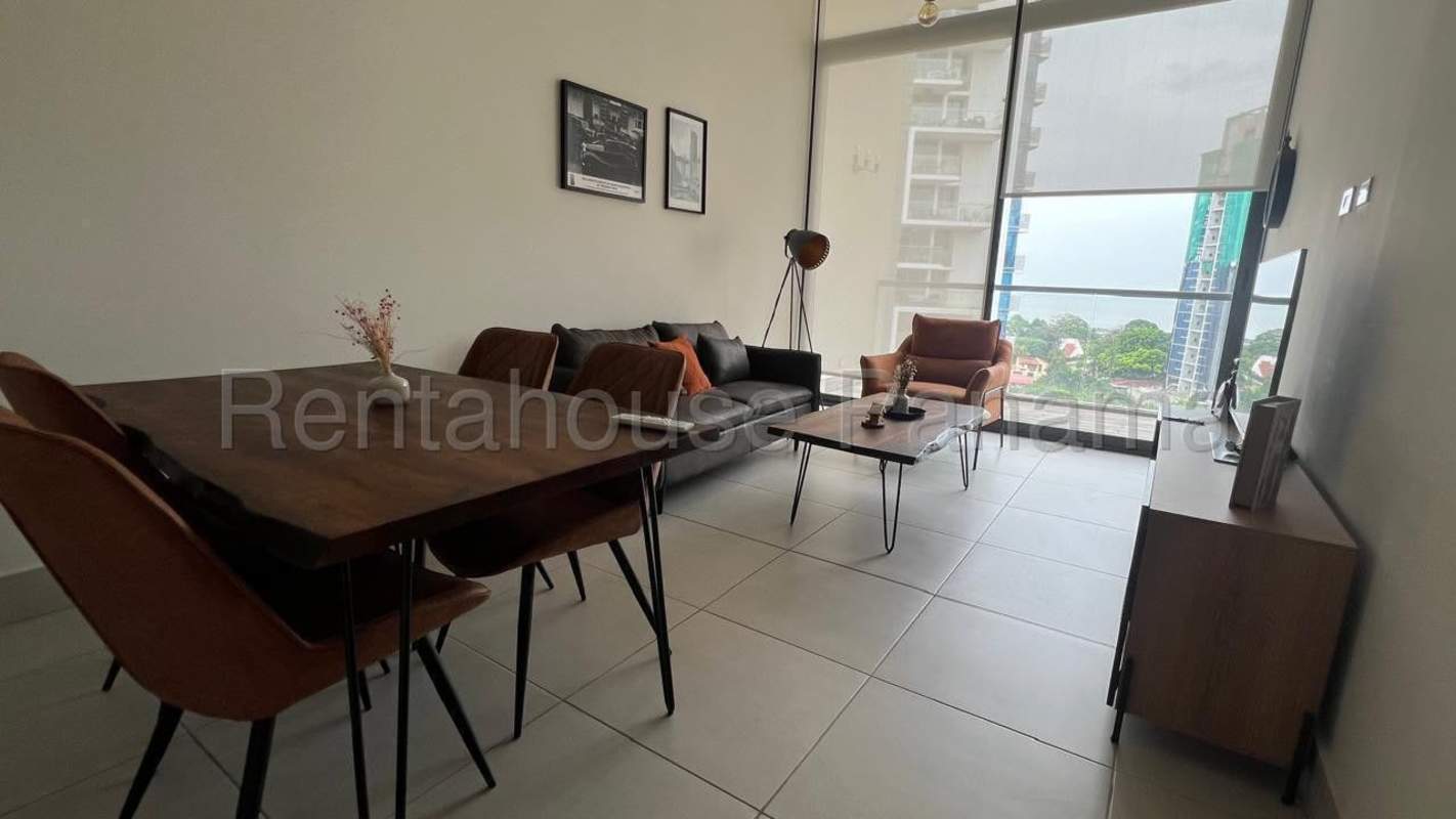 Open plan kitchen with dining space, appliances, and modern finishes at PH Coco Place Coco del Mar Panama