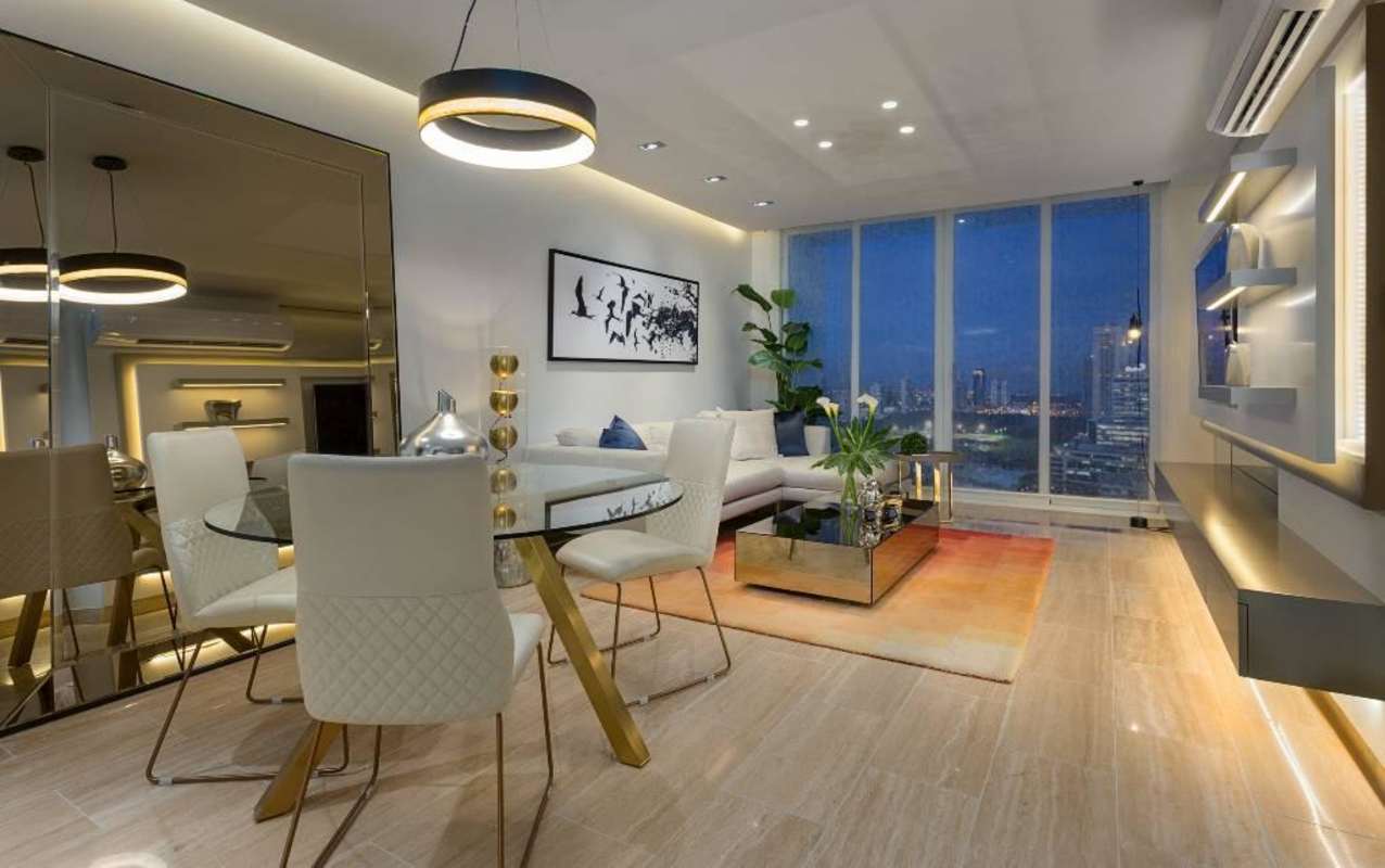 Master bedroom with large windows, modern decor, ensuite bathroom in PH The Regent