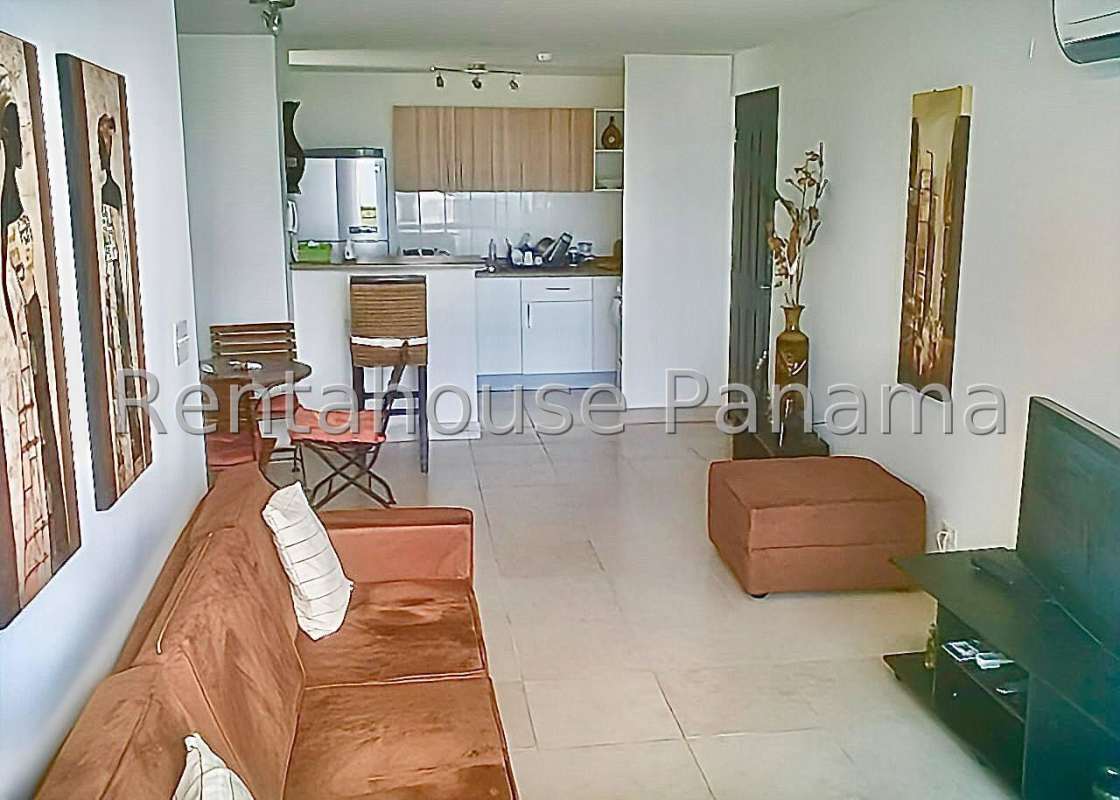 Dining room open plan to living room in apartment Splendor by The Park Carrasquilla Panama