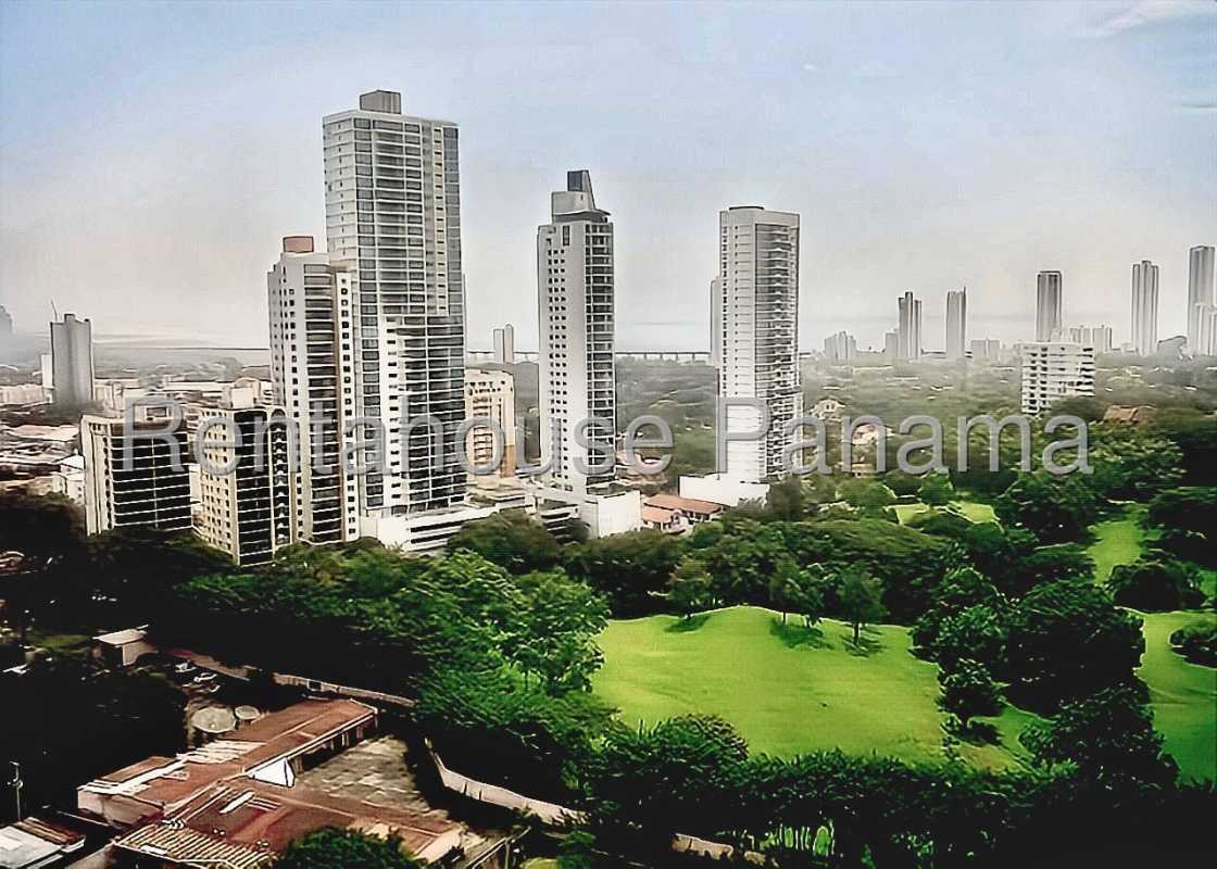 Kitchen with breakfast bar, appliances, and storage Splendor by The Park Carrasquilla Panama