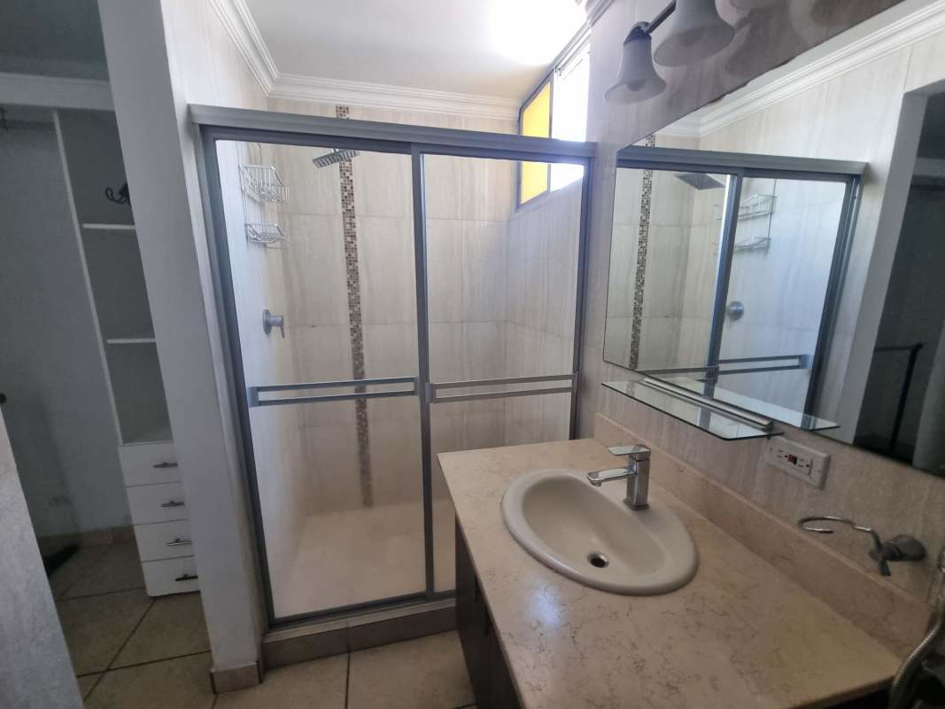 Rooftop swimming pool overlooking Panama City skyline at PH Victoria Hills