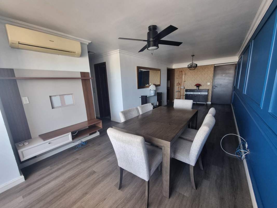 Galley kitchen with granite countertop, stove, fridge PH Victoria Hills Panama