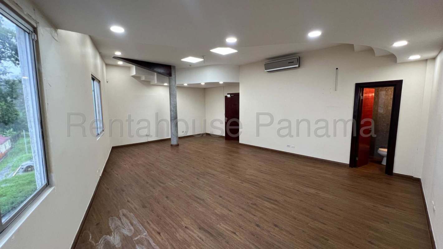 Compact kitchenette with cabinets and granite counter PH Financial Park Panama