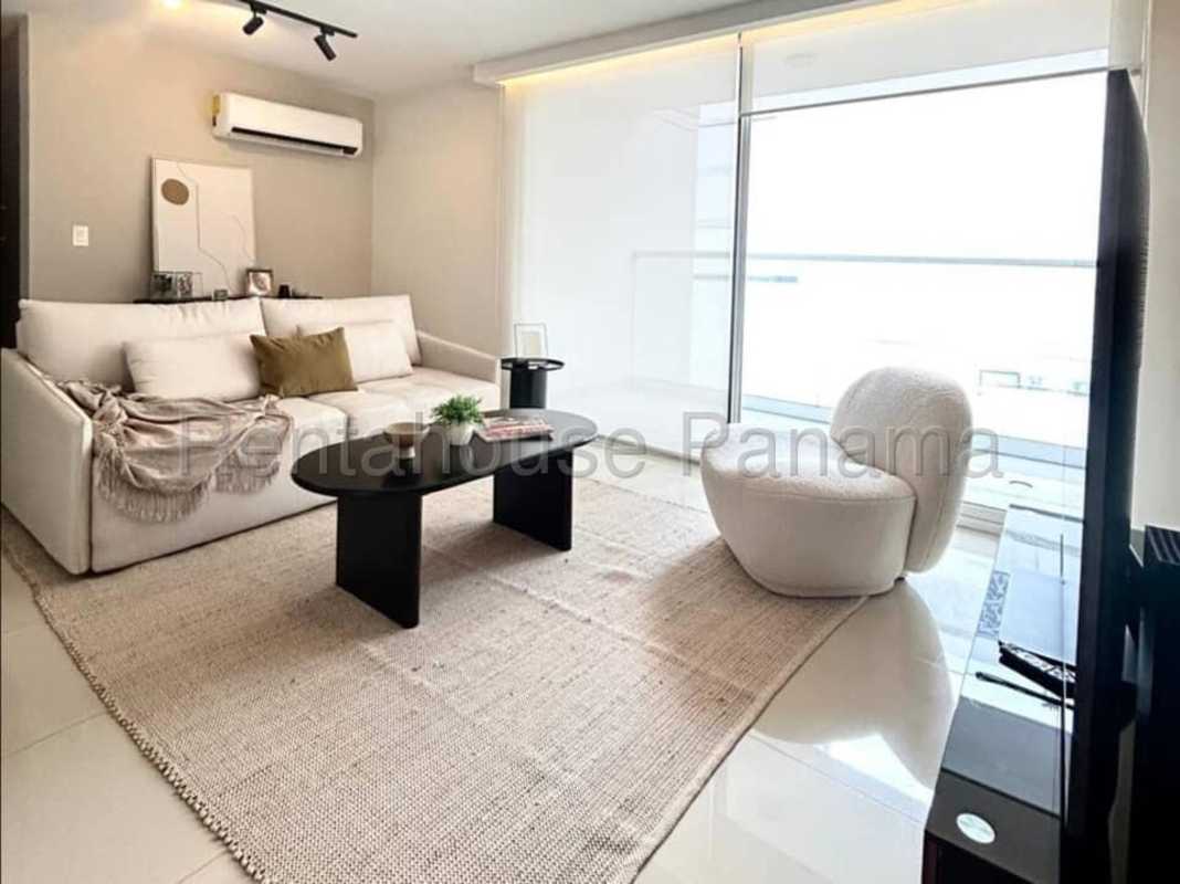 Bright living room with large sliding doors to balcony PH Pijao Costa del Este Panama for rent