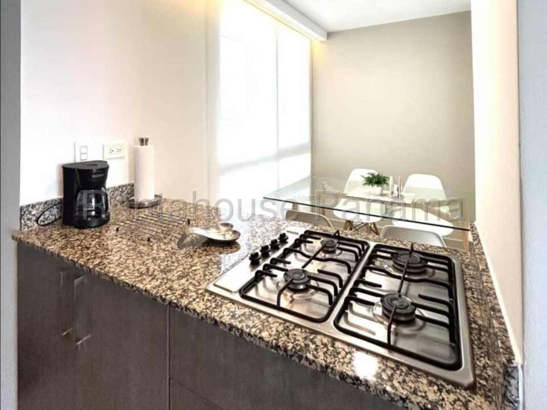 Granite kitchen countertops dining space PH Pijao apartment Costa del Este Panama