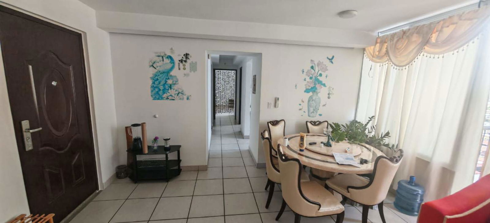Bright dining area large windows balcony access PH Lefevre 75 Parque Lefevre Panama City