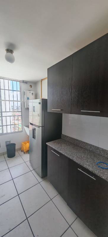 Granite countertops fridge stove cabinetry PH Lefevre 75 Parque Lefevre Panama City apartment