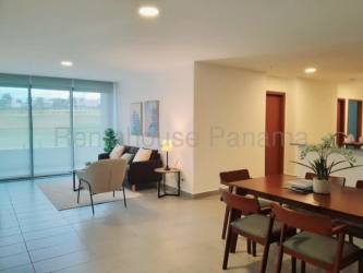 Open dining living space with sliding glass doors and modern design The District Costa Verde Panama