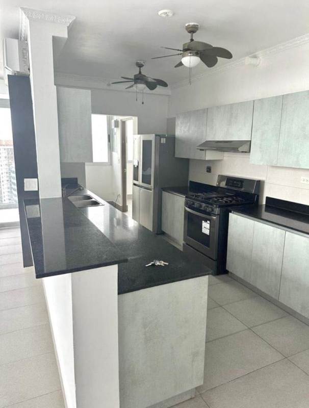 Modern kitchen with granite counters, appliances, light cabinetry PH Loma Vista Tower Panama City