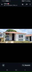 Contemporary single-story house with porch and red roof tiles in Urbanización El Prado La Chorrera Panama