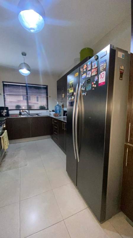 Modern kitchen dark wood terrazzo countertops PH Villa Tivoli Brisas del Golf Panama