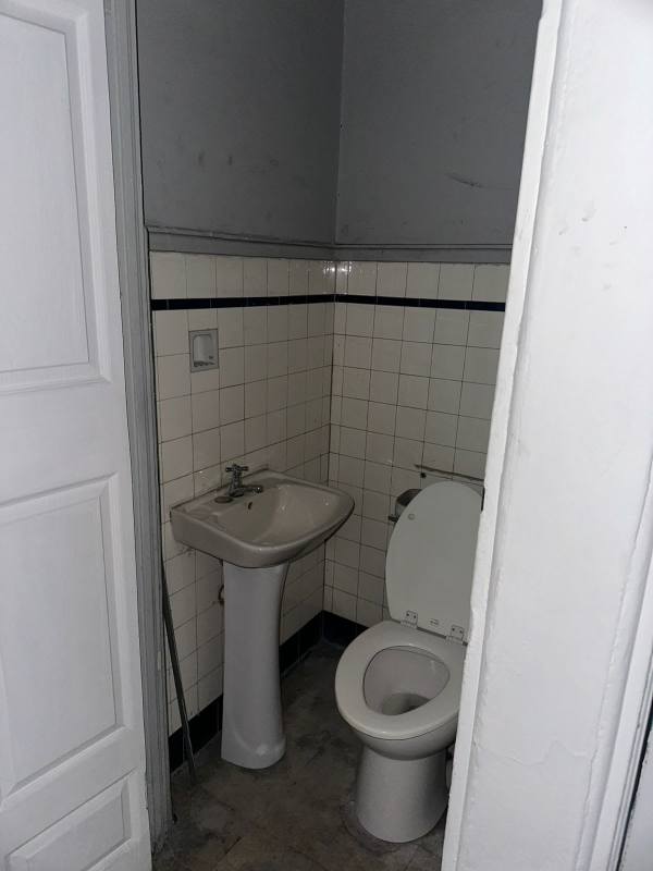 Large glass window facade with stone features of commercial rental Bella Vista Panama