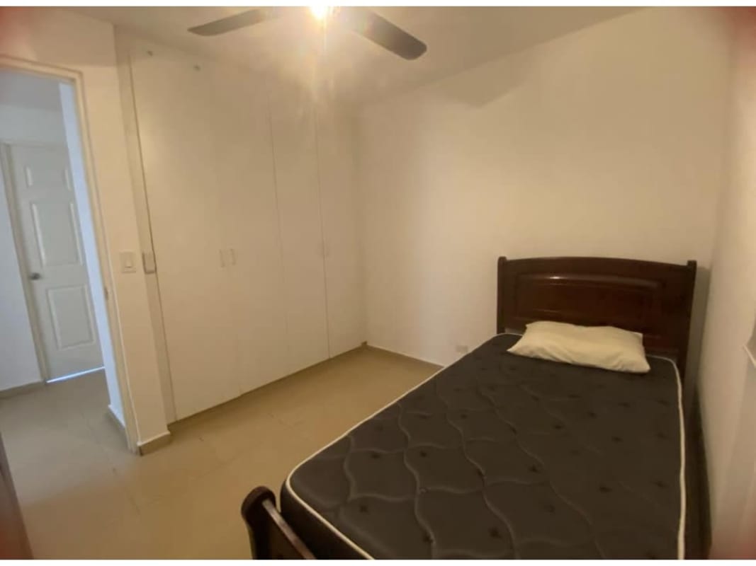 Second bedroom with built-in closet ceiling fan tile floor Mystic Hills Panama
