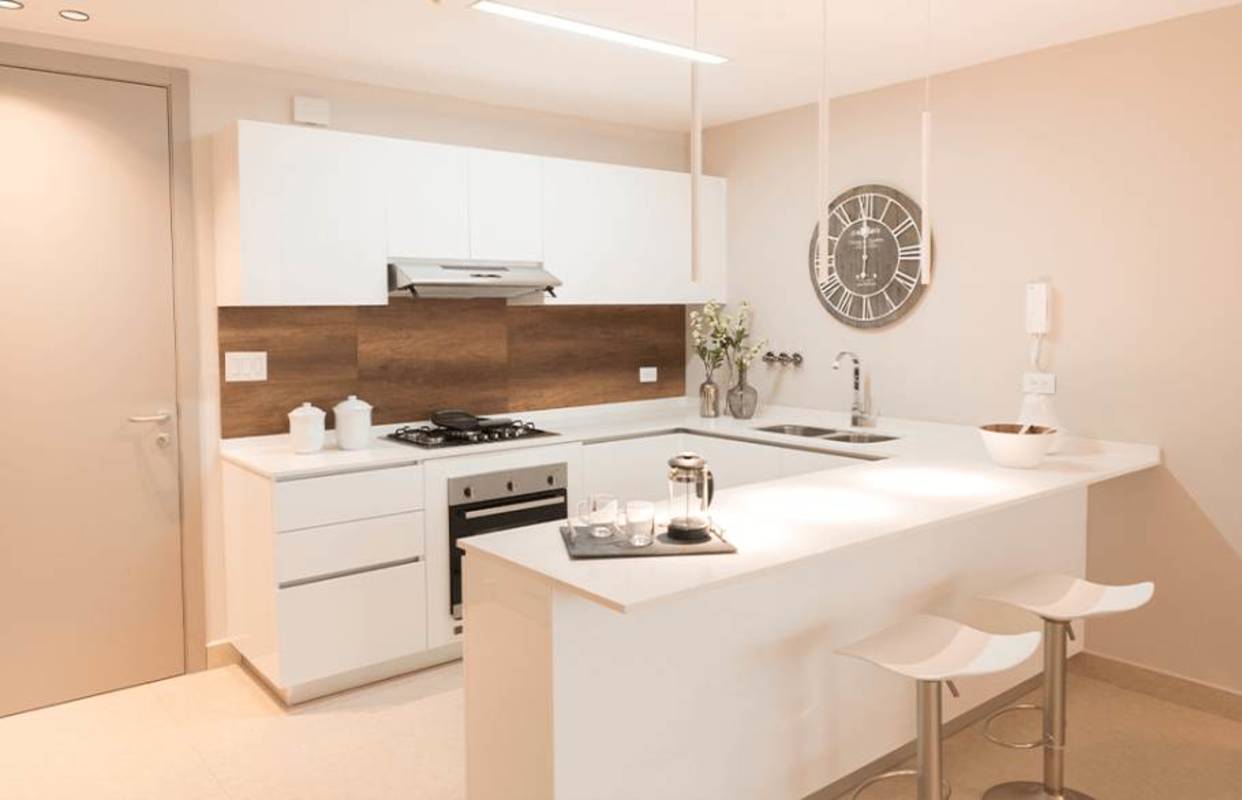 Modern bathroom with glass shower enclosure in PH URBAN El Cangrejo Panama City