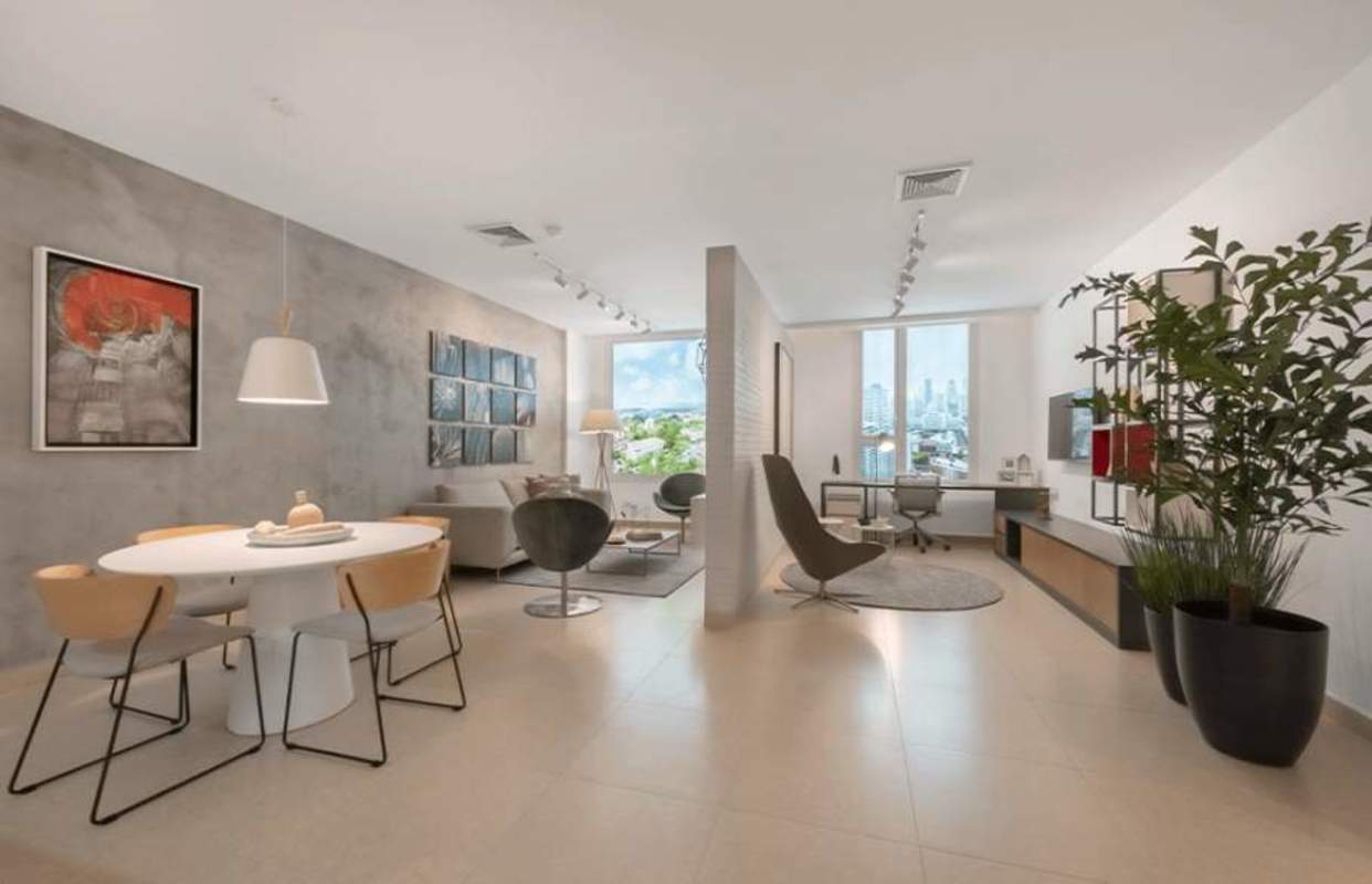 Contemporary open-plan living space with large windows city view PH Cangrejo City View Panama