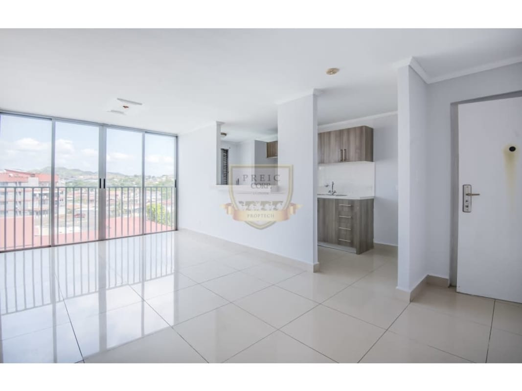 Bright living room with balcony doors and city views in PH Ibiza Transístmica Panama