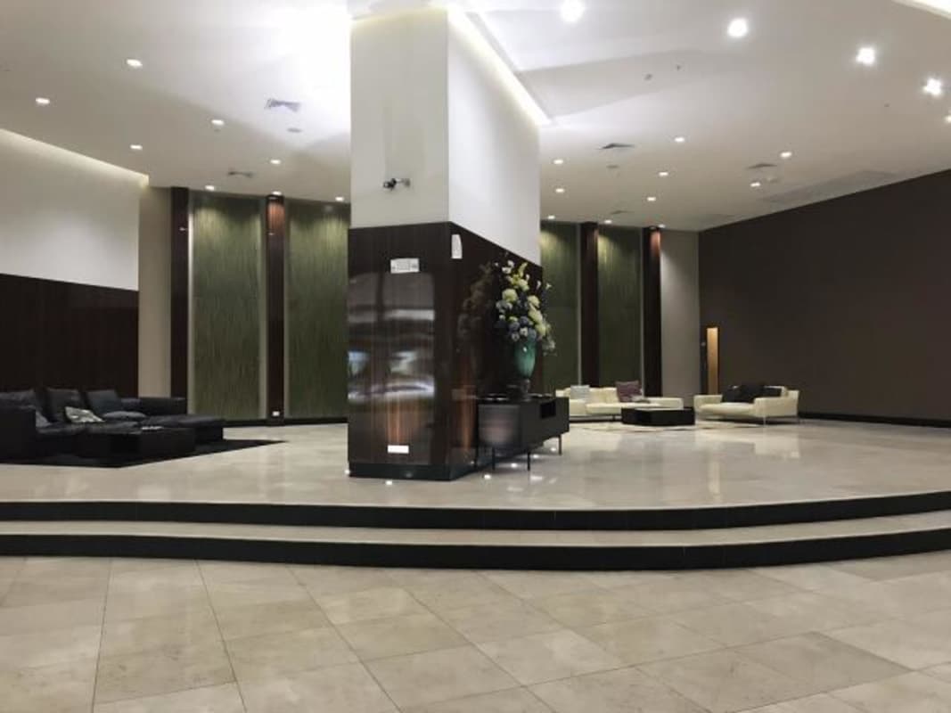 Bedroom furnished with bed and AC overlooking ocean at PH Oasis on the Bay Punta Pacifica Panama City