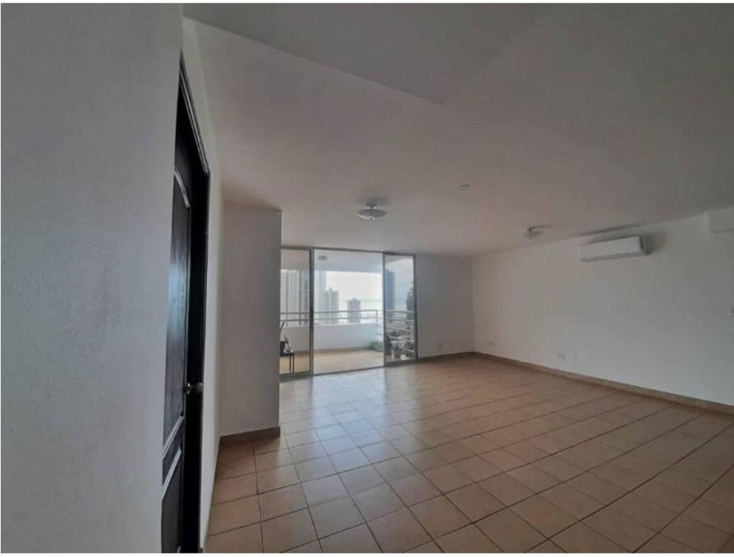 Bright living and dining area with large windows, ocean and city views penthouse PH Lefevre Panama City