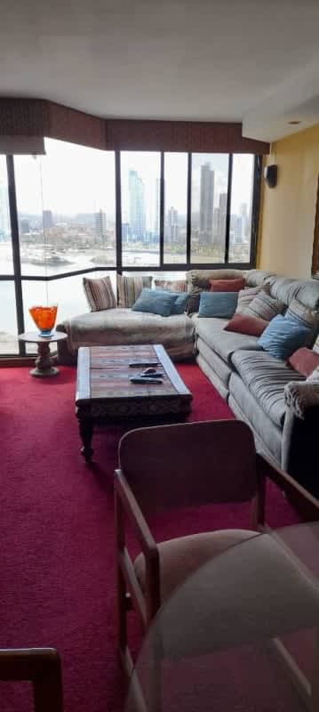 Living room with ocean and city vistas Punta Paitilla PH Mediterrane Junior Panama