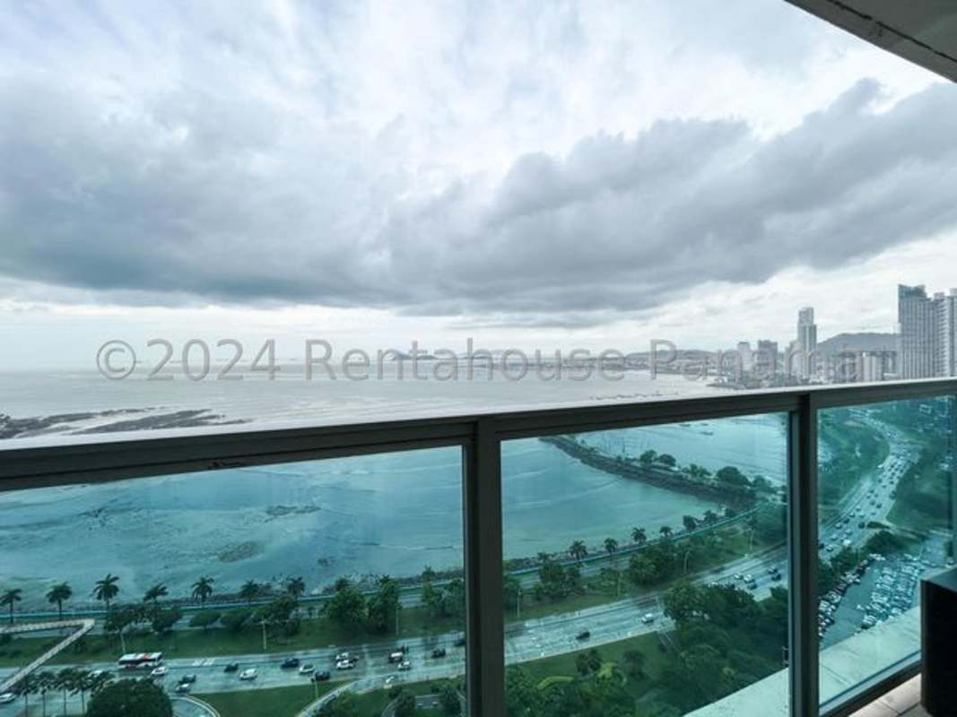 Bright luxury living room with ocean views, designer sofa set PH Yoo Panama