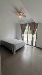 Bright bathroom with glass shower and vessel sink PH Mosaic Panama Pacifico