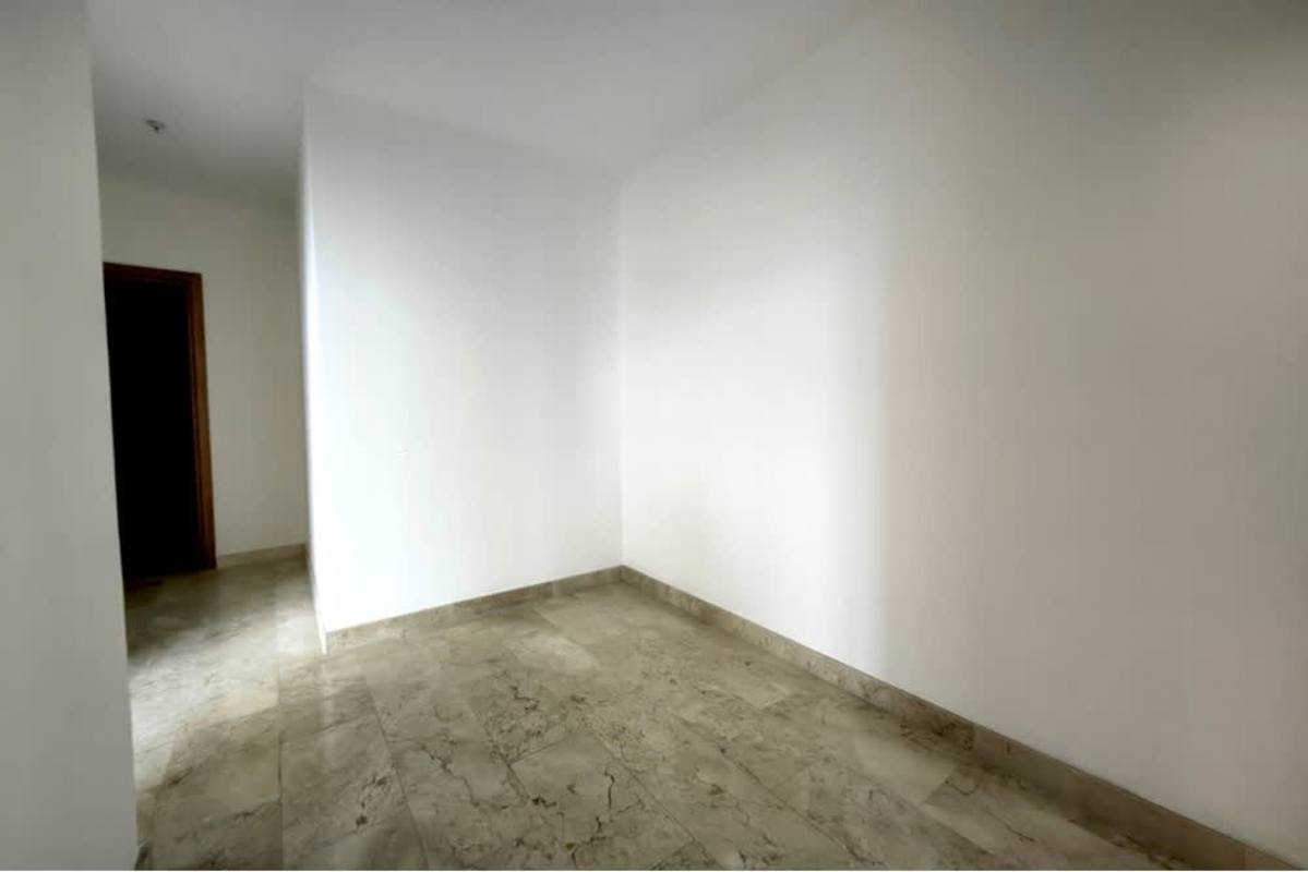 Empty hallway with marble floors and neutral walls in luxury PH Bella Vista Manhattan